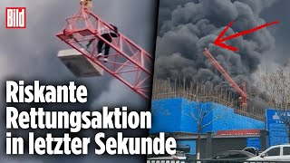 Dramatische Rettungsaktion: Kranführer mit irrer Idee | China