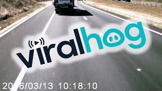 Sparks Fly as Truck Almost Rolls || ViralHog