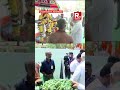 amit shah inaugurates new bjp office in coimbatore feeds cows and plants sapling