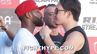 FLOYD MAYWEATHER PUSHES MIKURU ASAKURA OUT OF HIS FACE WITH BODYGUARD; STARES HIM DOWN AT FACE OFF