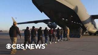 Military planes used to deport migrants; giant pandas return to National Zoo, more | America Decides