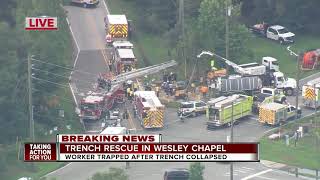 Emergency crews working to rescue worker after trench collapse in Pasco County