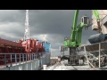 sennebogen port handling 870 mobile material handler loading ships in antwerp belgium