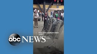 Balloon robot walks across room at tech event