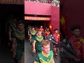 Australian Schoolboys and Junior Kumuls coming down the tunnel at the PMs13 in Papua New Guinea