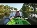 bich dong vietnam foot paddling boat ride through stunning scenery