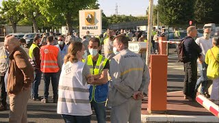 Renault employees gather at plant after news of jobs cuts | AFP