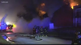 Neighbors evacuate after 2 vacant homes catch fire in south St. Louis