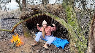 Building a Primitive Shelter Under a Fallen Tree. Survival in the Steppe