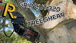 Grip Cut 320 Tree Shear clearing wooded area