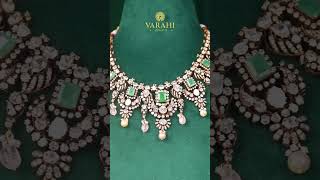 Polki diamond necklace with emerald stones and beads.