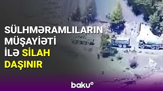 Sülhməramlıların müşayiəti ilə silah daşınır