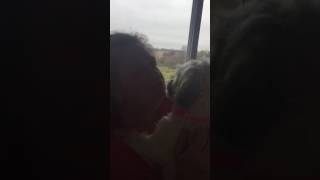 Grandmother getting kissed
