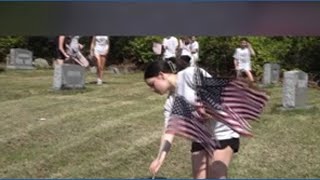 Students replace flags ahead of Memorial Day