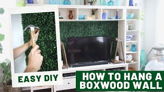 How to hang a DIY boxwood backdrop wall in your home