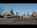 oc transpo and sto buses passing parliament hill