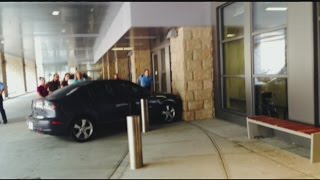 Woman drives car into Baystate Medical Center