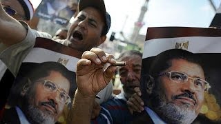 Egypt: Mursi held in glass cage for adjourned trial