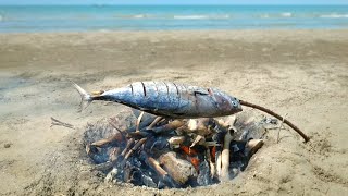 Grilled fish on the tropical beach, natural cooking