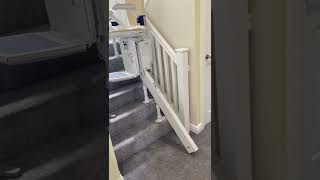 Mansfield Mobility Centre curved stairlift with auto hinged rail and a 180 degree top park