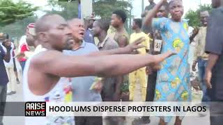 HOODLUMS DISPERSE PROTESTERS IN LAGOS