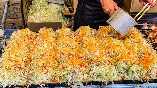 japanese street food - hiroshima style okonomiyaki  お好み焼き ( hiroshimayaki )