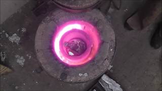 Melting and pouring metal to make a casting