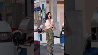 Attractive Asian beauty seen at a gas station