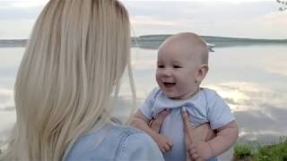 A mom playing with her baby on the beach- Top Kids Free Stock Videos
