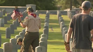 Houston National Cemetery honors the fallen on Memorial Day weekend with flag placing ceremony