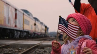 Mourners honor George H.W. Bush along train route