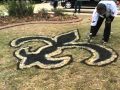 Artist Creates 'Lawn-De-Lis' In Local Yards