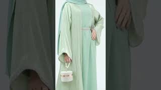 This vibrant abaya adds a touch of freshness to your style. #abaya #hijab