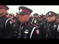 rcmp police and army all marching together to moncton coliseum