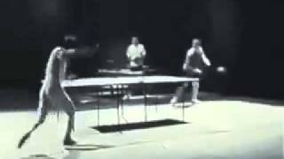Bruce Lee playing Ping Pong