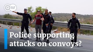 Peace activists protect Gaza-bound aid convoys from attacks by Israeli extremists | DW News