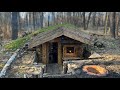 Outdoor STOVE next to an UNDERGROUND HOUSE, spring day in the DUGOUT