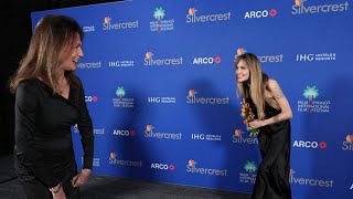 Angelina Jolie receives an award from godmother Jacqueline Bisset at Palm Springs Film Festival.