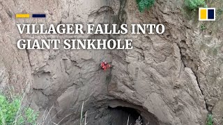 Villager rescued from bottom of a 100-metre sinkhole in northwest China