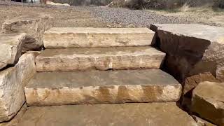 Fort Collins Colorado Hardscape. Paver patio with boulder wall and natural stone staircase