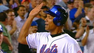 Moises Alou belts a home run to extend his hit streak to 30