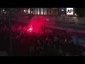 Flares light up Tel Aviv demo over police ouster