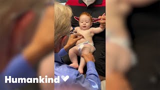 Doctor makes baby giggle during shots | Humankind