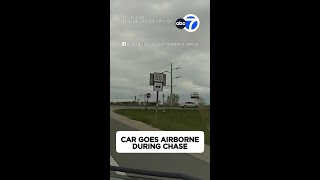Car goes airborne during chase