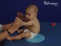 6 month old babies in pull to sit movement typical and atypical development comparison