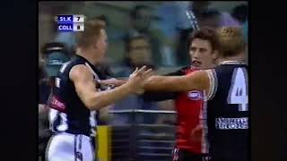 Stephen Milne slaps Nathan Buckley 2002