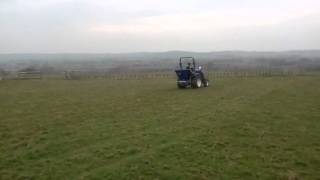 25hp Landlegend Tractor making easy work of spreading ferti