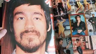 Bruce Lee posters and big magazines