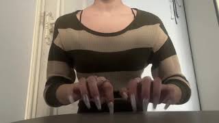 Long nails quickly scratching a leather chair ASMR quick scratching