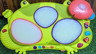 B. Toys Frog Drum Ribbit-Tat-Tat